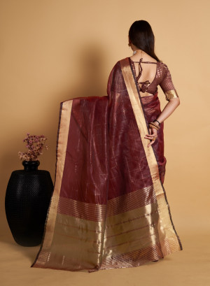 Maroon color organza silk saree with zari weaving work