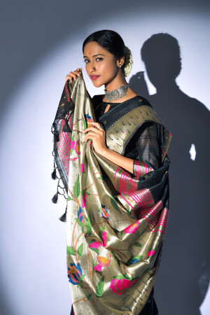 Black color tussar silk saree with zari weaving work