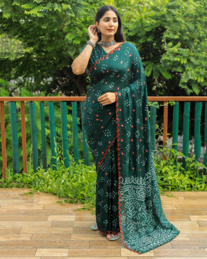 Dark green color soft bandhej silk saree with sequence work