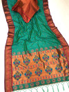 Light rama green color paithani silk saree with zari weaving work