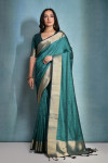 Rama green color soft raw silk saree with zari weaving work