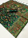 Dark green color soft pashmina silk saree with woven design
