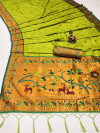 Parrot green color paithani silk saree with zari weaving work