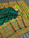 Green color soft pashmina silk saree with woven design