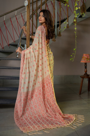 Peach color soft modal silk saree with woven design