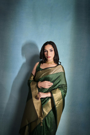 Green color soft raw silk saree with zari weaving work