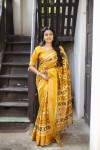 Yellow fancy patola printed dola silk saree