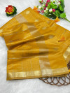 Yellow tussar silk cotton saree with zari woven work