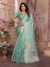 Sea green organza silk banarasi saree with golden zari leheriya weaving work