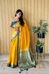 Yellow traditional paithani silk saree with zari weaving work