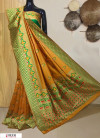 Yellow color Banarasi silk meenFuljarakari saree