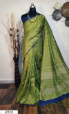 Green color Raw silk checks border saree