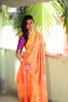 Orange color Soft raw silk embroidered saree