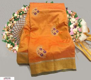 Yellow color Soft Raw silk embroidered work saree