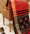 Red color soft raw silk saree with geometric woven pallu