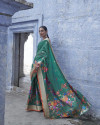 Green color pure jamdani weaving saree with zari work