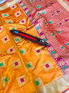 Orange color kanjivaram silk saree with zari and jacquard weaving work