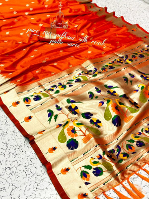 Orange color paithani silk saree with zari work