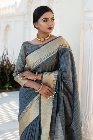 Gray color tassar silk saree with zari woven work