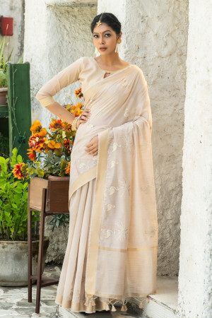 Cream color linen cotton saree with zari weaving embroidered work