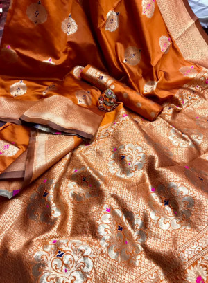 Orange color soft banarasi silk saree with golden zari butta