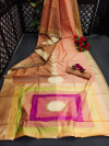 Peach color pure linen saree with colorful temple woven zari border