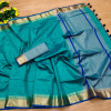 Rama green color tussar silk saree with zari woven pallu