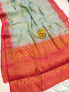 Sky blue color muslin silk saree with zari woven work