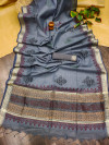 Gray color linen silk saree with temple woven border