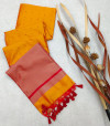 Orange color tussar silk saree with zari woven pallu