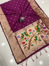 Magenta color paithani silk saree with golden zari work