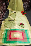Green color pure linen saree with colorful temple woven zari border