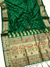 Dark green color soft paithani silk saree with zari woven work