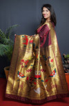 Maroon color paithani silk saree with golden zari weaving work