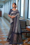 Gray color soft tussar silk saree with zari woven work