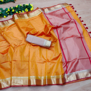 Orange color tussar silk saree with zari woven pallu