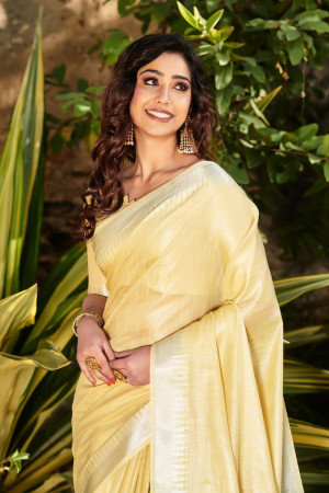 Yellow color linen saree with zari weaving temple border