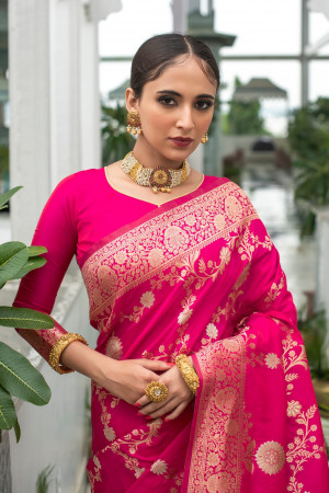 Rani pink color soft banarasi silk saree with zari woven work