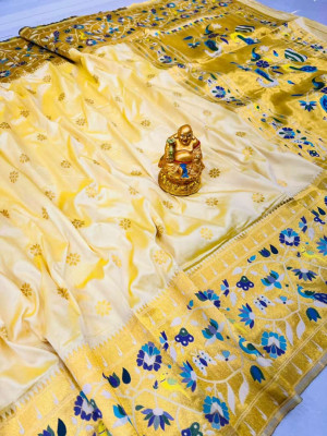 Off white color paithani silk saree with golde zari weaving work