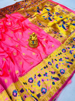 Baby pink color paithani silk saree with golde zari weaving work