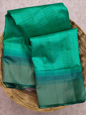 Sea green color south silk saree with zari woven contrast border
