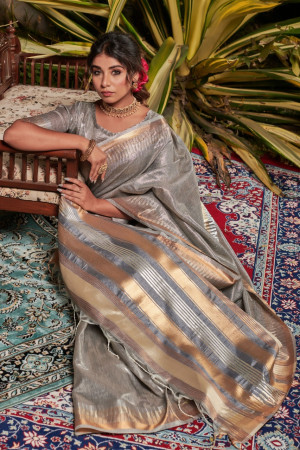 Gray color metallic linen saree with zari work