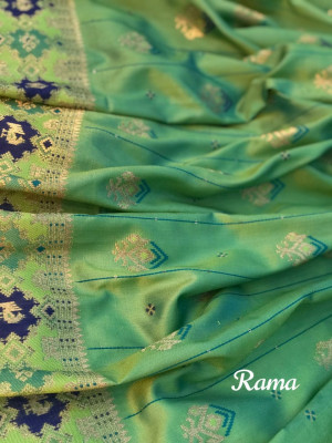 Green color banarasi silk saree with rich pallu