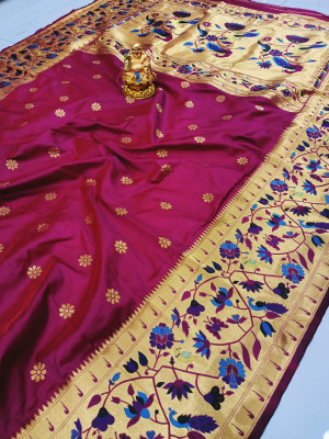Magenta color paithani silk saree with golde zari weaving work