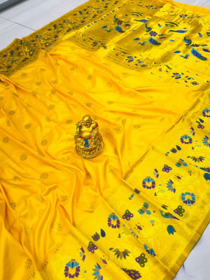 Yellow color paithani silk saree with golde zari weaving work