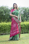 Green color bandhani silk saree with hand bandhej printed work