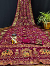 Maroon color pure hand bandhej silk saree with zari weaving work