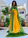 Yellow and green color soft bandhej silk saree with zari weaving work
