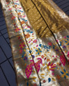 Mustard yellow color paithani silk saree with zari weaving work