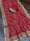 Red color georgette saree with bandhej printed work